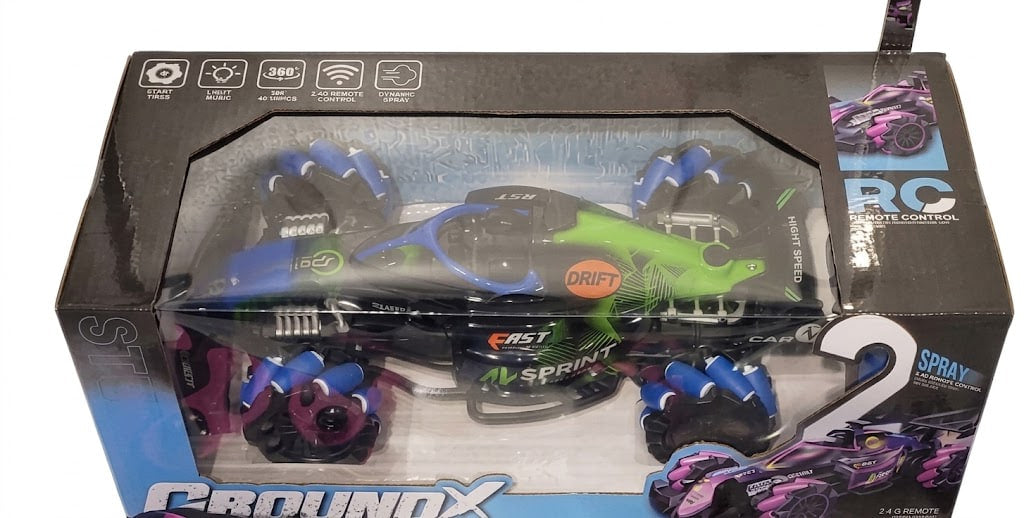 A boxed remote control car set labeled Groundx 2, showing the product inside its retail packaging with a clear front window. The package includes printed graphics of the blue, black, and neon green car, plus smaller alternate color variants.