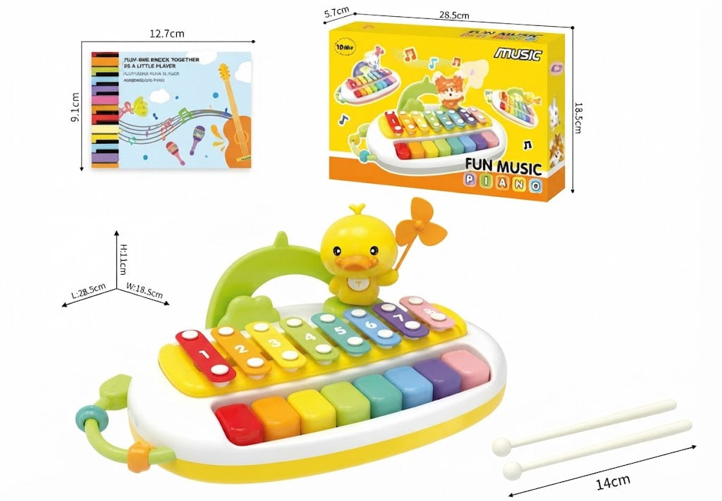 A colorful children's toy xylophone with a yellow duck character, shown with its retail box, a small accessory book, and measurement callouts on a white background.