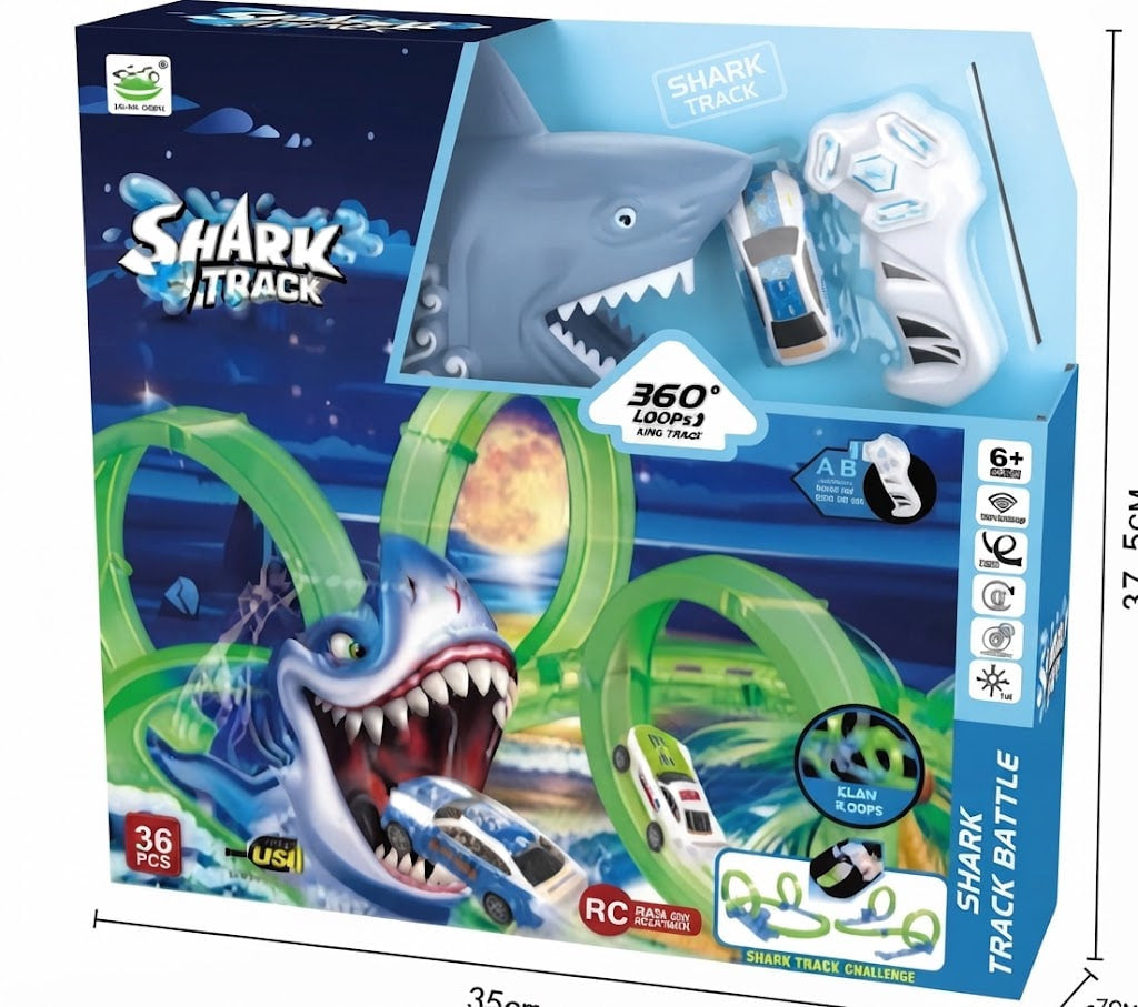 Shark Track RC car racing set in its retail packaging, featuring a shark-themed box with illustrations of a shark, green loops, and toy cars. The package shows 360-degree rotating tracks and 36 pieces.