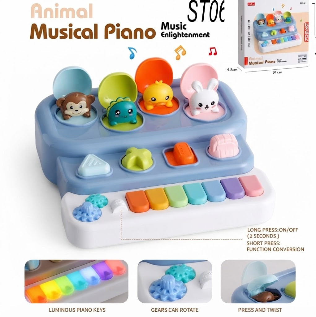 An animal musical piano toy for toddlers, featuring a light blue body, a white piano keyboard with colorful keys, and four animal-shaped keys (monkey, frog, duck, rabbit) that open to reveal toys. The image includes product features, size information, and close-up detail insets on a white background.