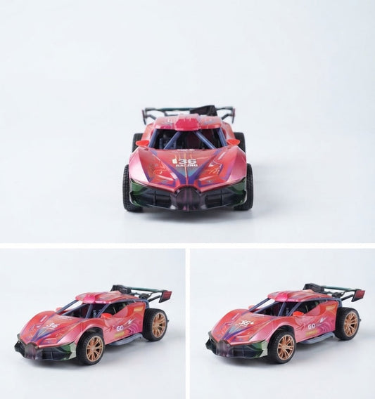 A small remote-control toy race car shown from the front and side angles on a clean white background. The car has a pink and red body with black, blue, and green graphics, and gold-colored wheels.