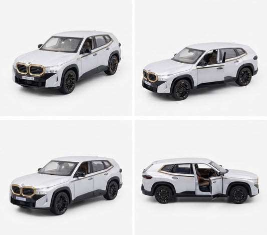 A white die-cast model SUV shown from four angles in a 2x2 grid on a light gray background. The model features a distinctive kidney grille, black wheels, and an open driver's side door in one view.