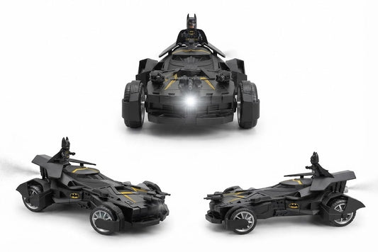 Three views of a black Batman Batwing toy vehicle on a clean white background, with a small Batman figure seated in the cockpit.