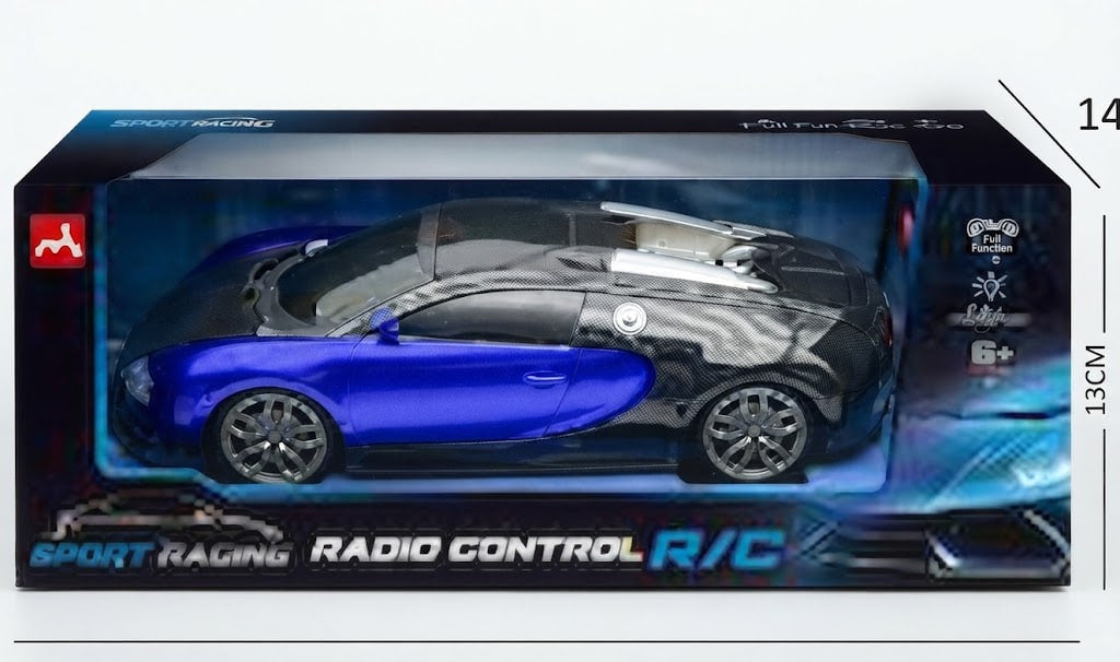 A blue and black toy sports car in its retail packaging, labeled 'SPORT RACING RADIO CONTROL R/C'. The box features a clear window showing the model car inside, with dimensions marked on the right side.