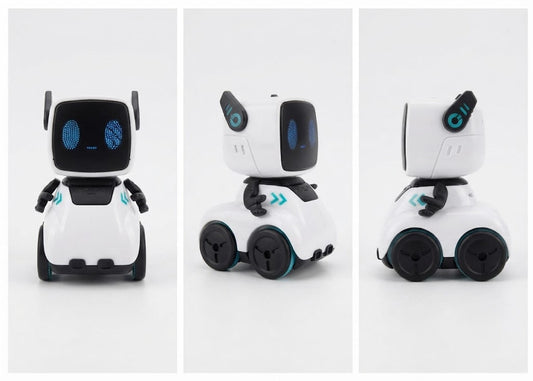 Three views of a small white and black robot toy with blue accents, shown on a clean light gray background.