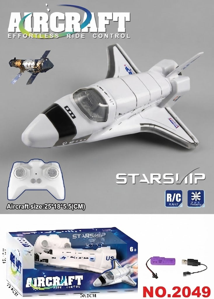 A white and black RC space shuttle model aircraft with its remote control, USB cable, and retail box, displayed on a gray background with product text and branding.