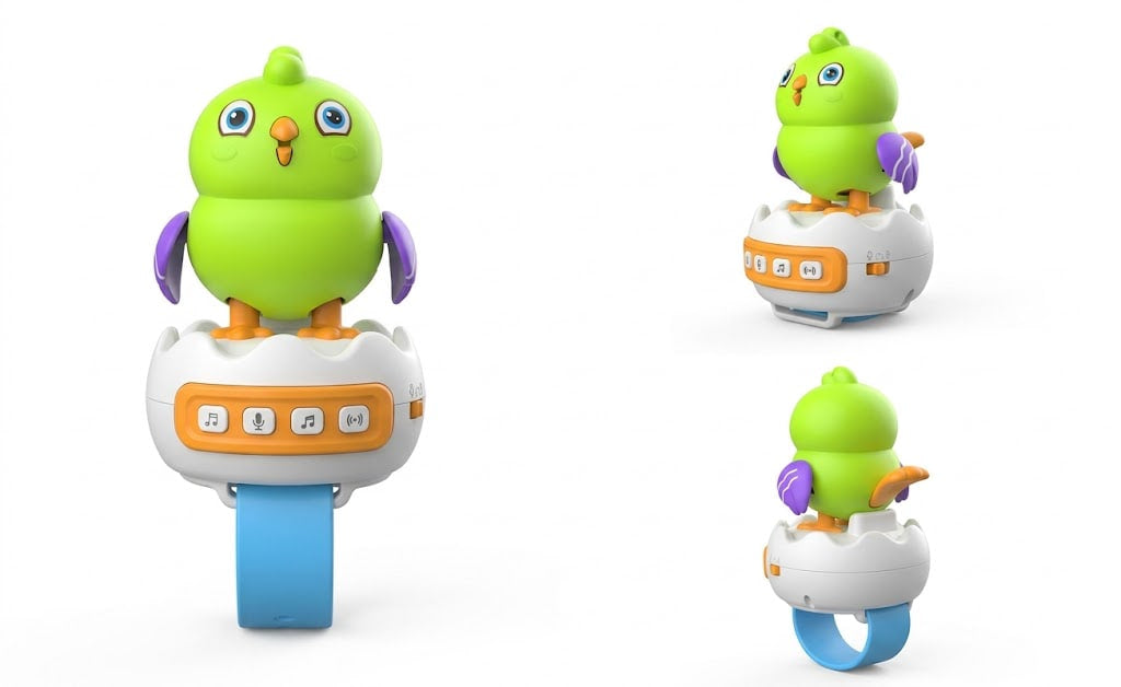 A colorful baby bird toy shown from three angles on a white background. The toy features a bright green bird character with purple wings and an orange beak, sitting on a white egg-shaped base with a blue ring and orange control panel.