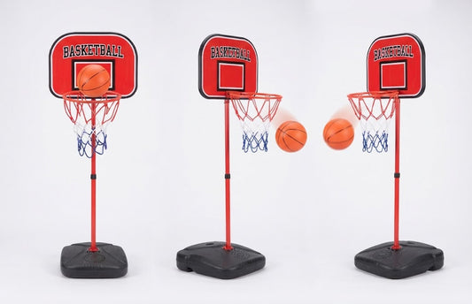 Three mini basketball hoops with red backboards and black bases, shown on a white studio background with two orange basketballs in flight.